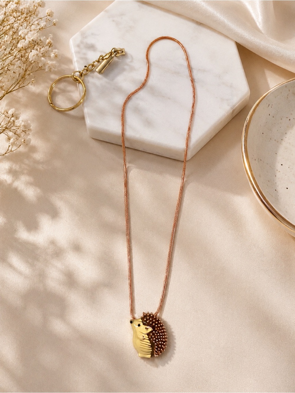 paparazzi Gold and Brown Hedgehog Pendant Necklace